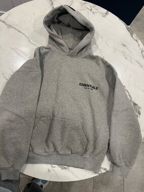 ESSENTIALS Light Gray Pullover Hoodie with Chest Logo